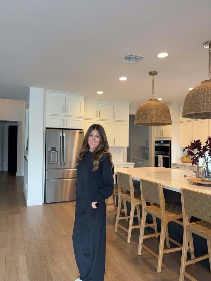 Customer at home in monochrome black outfit